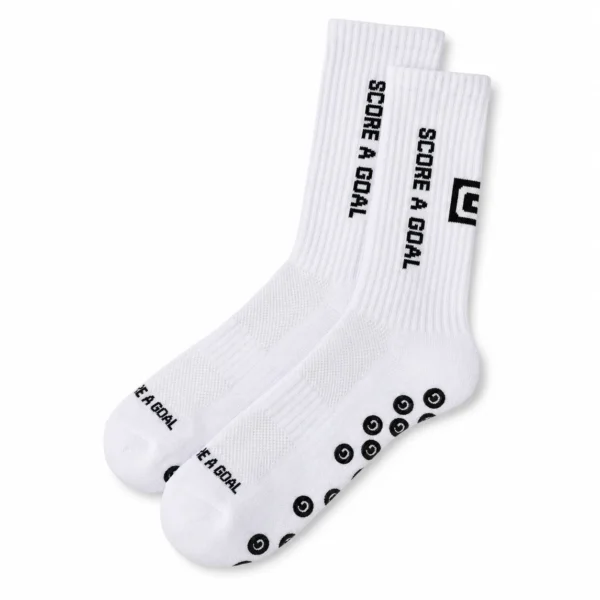 White custom athletic socks with knitted logo and non-slip grips