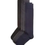 Four pairs of custom over the calf dress socks in black, gray and navy.