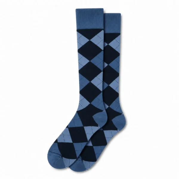 Pair of blue argyle custom over the calf dress socks on a white background.