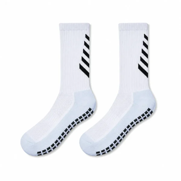 Pair of white soccer grip socks with black chevron leg details and black anti-slip sole pads.