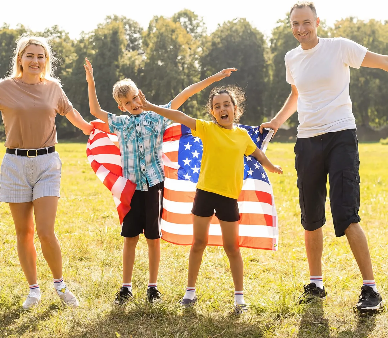 Family wearing custom quarter crew socks at an outdoor patriotic event.